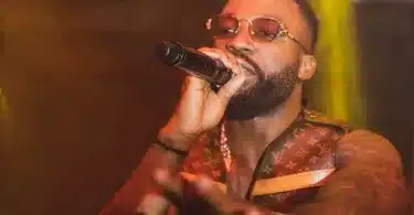 Moment Iyanya pushes fan off stage for slapping him with money